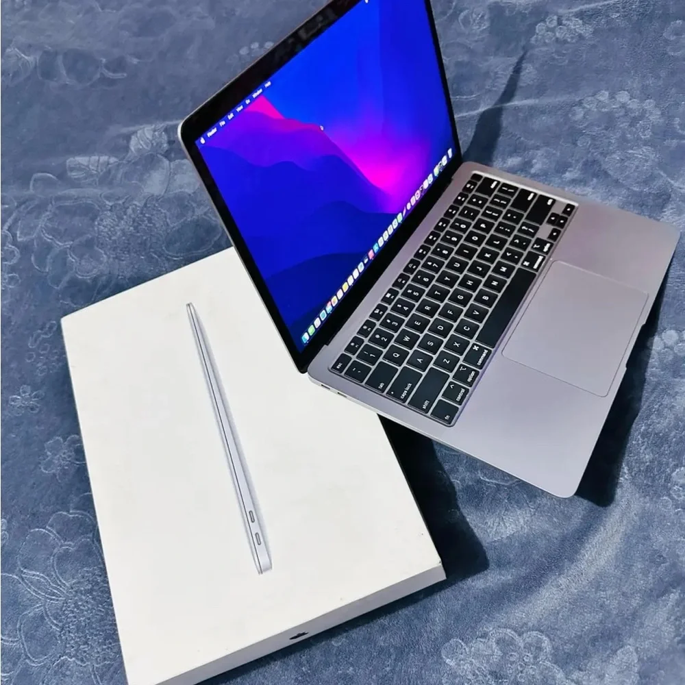 Apple Laptop in Silver with Black Keyboard